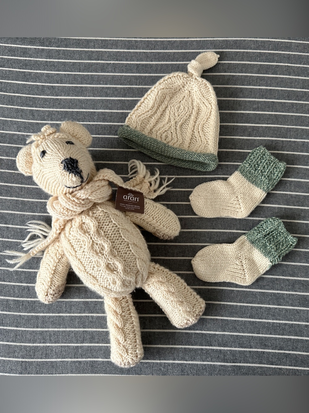Aran Merino Wool Cream Knit Bear Toy with Cream & Green Baby Hat and Socks